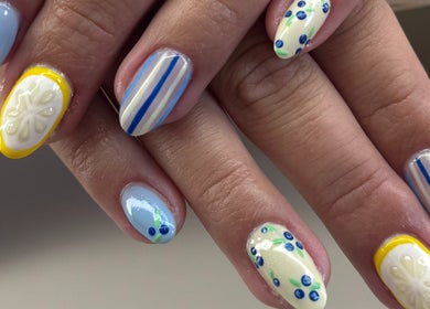 Vibrant lemon-themed nail art at Skinngleam Esthetics, Boca Raton, Florida, US.