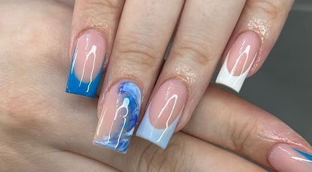 Stylish ocean-themed nails at ELLITE TANNING AESTHETICS & BEAUTY BAR in Sheffield, England, GB.