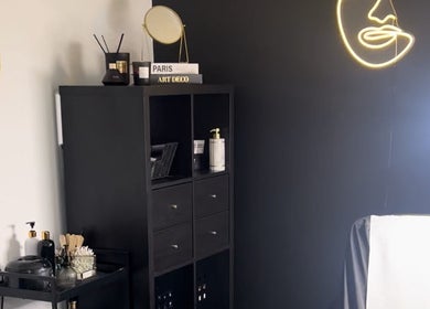 Chic interior of ELLITE TANNING AESTHETICS & BEAUTY BAR, Sheffield, England, with stylish storage and decor.