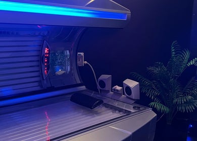 Tanning bed with blue lights at ELLITE TANNING AESTHETICS & BEAUTY BAR, Sheffield, England, GB.
