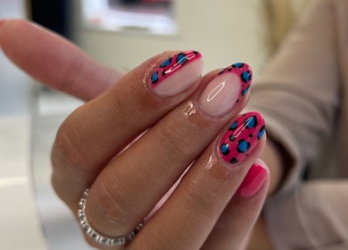 Bright, colorful nail art at ELLITE TANNING AESTHETICS & BEAUTY BAR in Sheffield, England, GB.