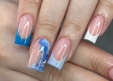 Stylish blue and white nails at Ellite Tanning Aesthetics & Beauty Bar, Sheffield, England, GB.