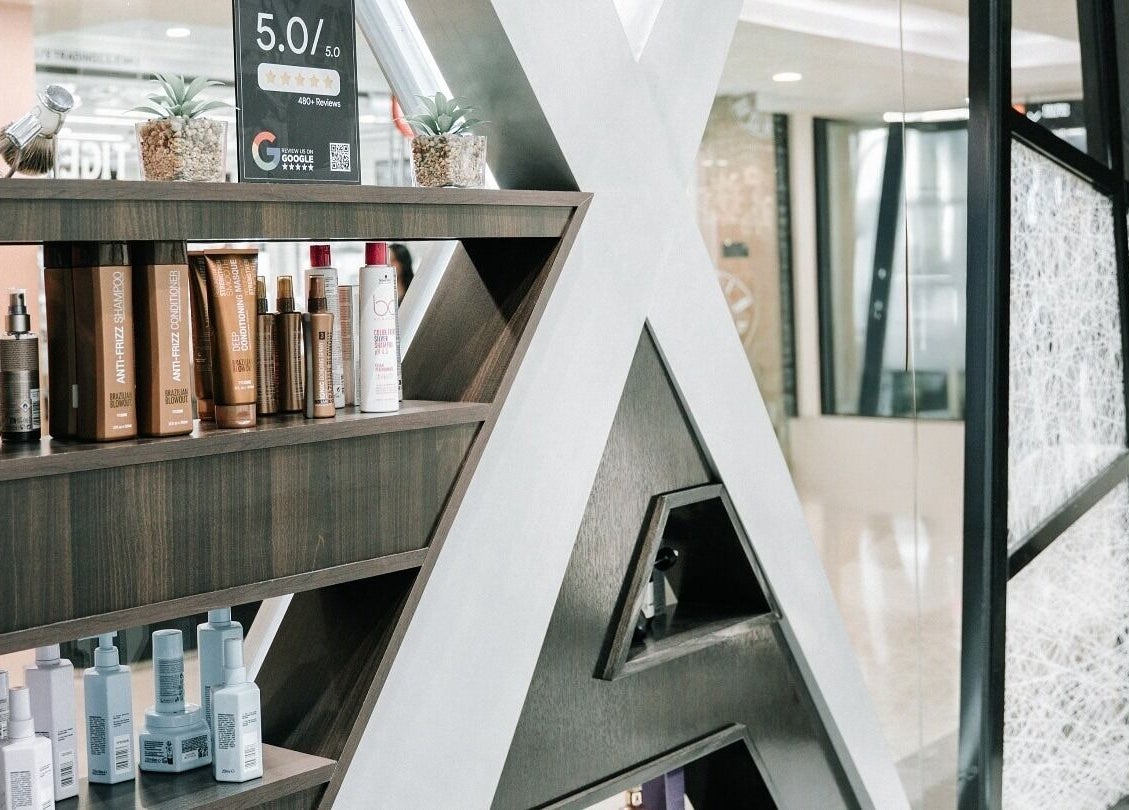 Product display at X Hair Lounge - City Center Mirdif, Dubai, AE showcasing hair care products.