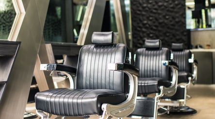 Luxurious salon chairs at X Hair Lounge - City Walk, Dubai, AE, highlighting upscale styling experience.