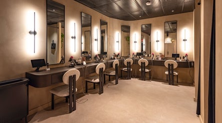 Sleek beauty station at Aura Head Spa | Montclair, Montclair, New Jersey, US, featuring mirrors and styling chairs.