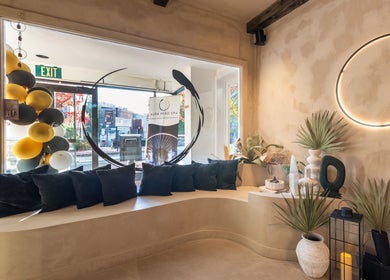 Relaxing seating area at Aura Head Spa | Montclair, Montclair, New Jersey, US, with modern decor and natural light.