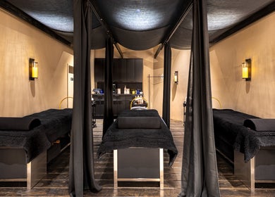 Relaxing spa treatment room at Aura Head Spa | Montclair, Montclair, New Jersey, US with soothing lighting.