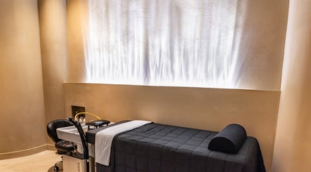 Tranquil treatment room at Aura Head Spa | Ridgewood, Ridgewood, New Jersey, US, featuring a massage table.