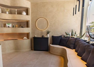 Relaxing waiting area at Aura Head Spa | Ridgewood, Ridgewood, New Jersey, US, with plush seating and natural decor.