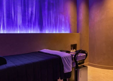 Relaxing massage room at Aura Head Spa | Ridgewood, featuring calming purple lighting, Ridgewood, New Jersey, US.
