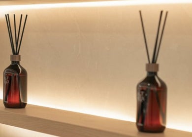 Elegant diffuser bottles on shelf at Jo:Hwa Hair & Living, Singapore, Singapore, SG, enhancing the tranquil ambiance.