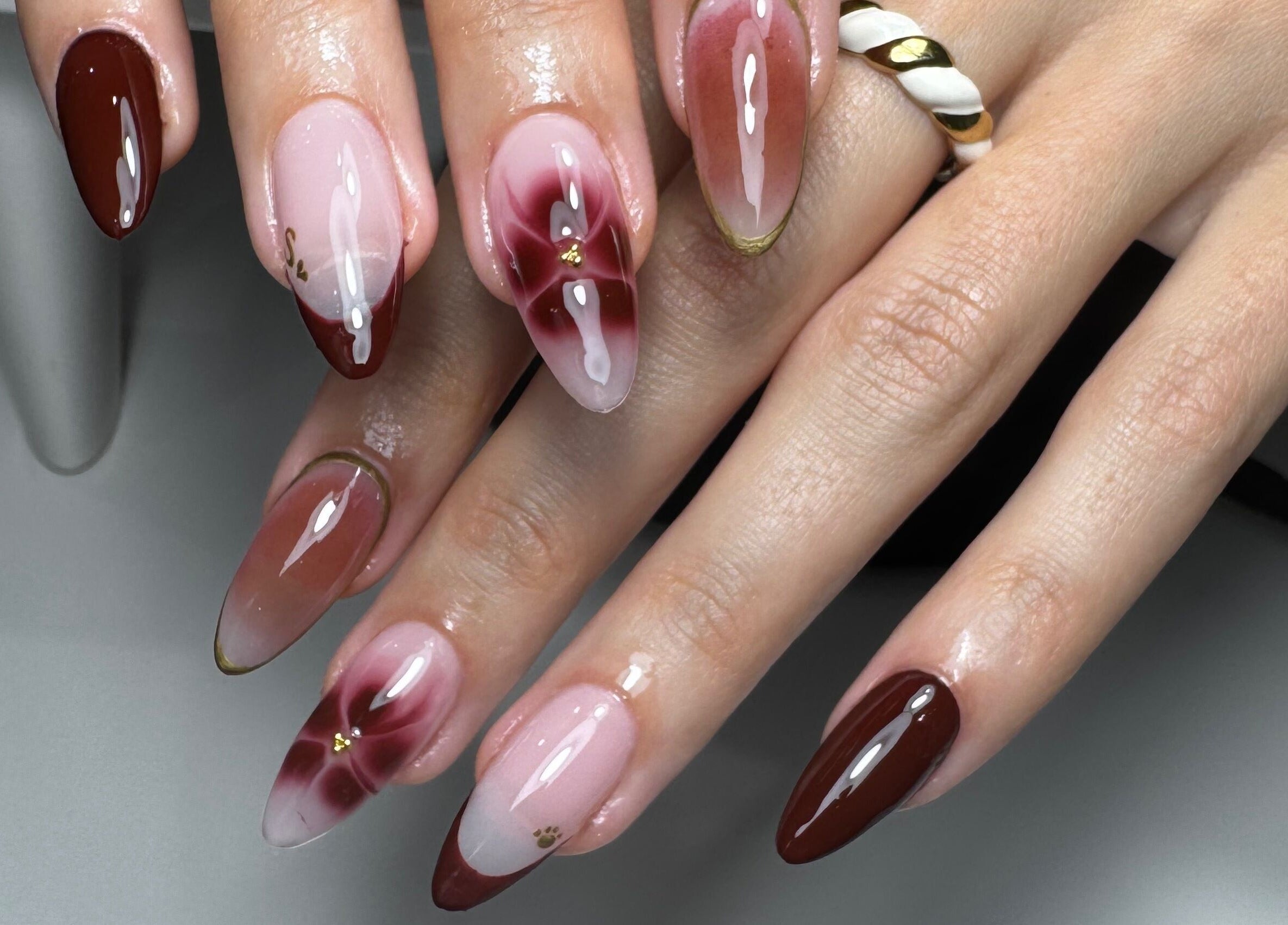 Stylish nail art featuring burgundy and pink tones by Gel Lane Co. in Southport, Queensland, AU.