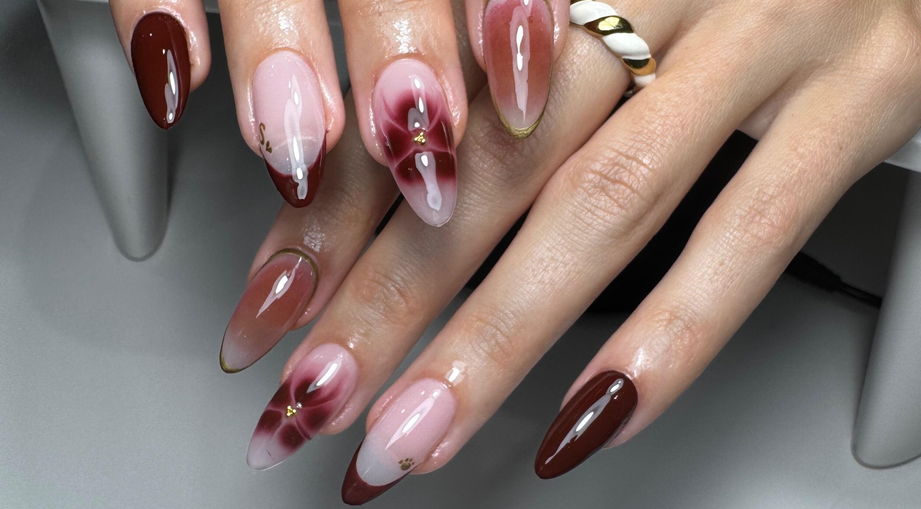 Stylish nail art featuring burgundy and pink tones by Gel Lane Co. in Southport, Queensland, AU.