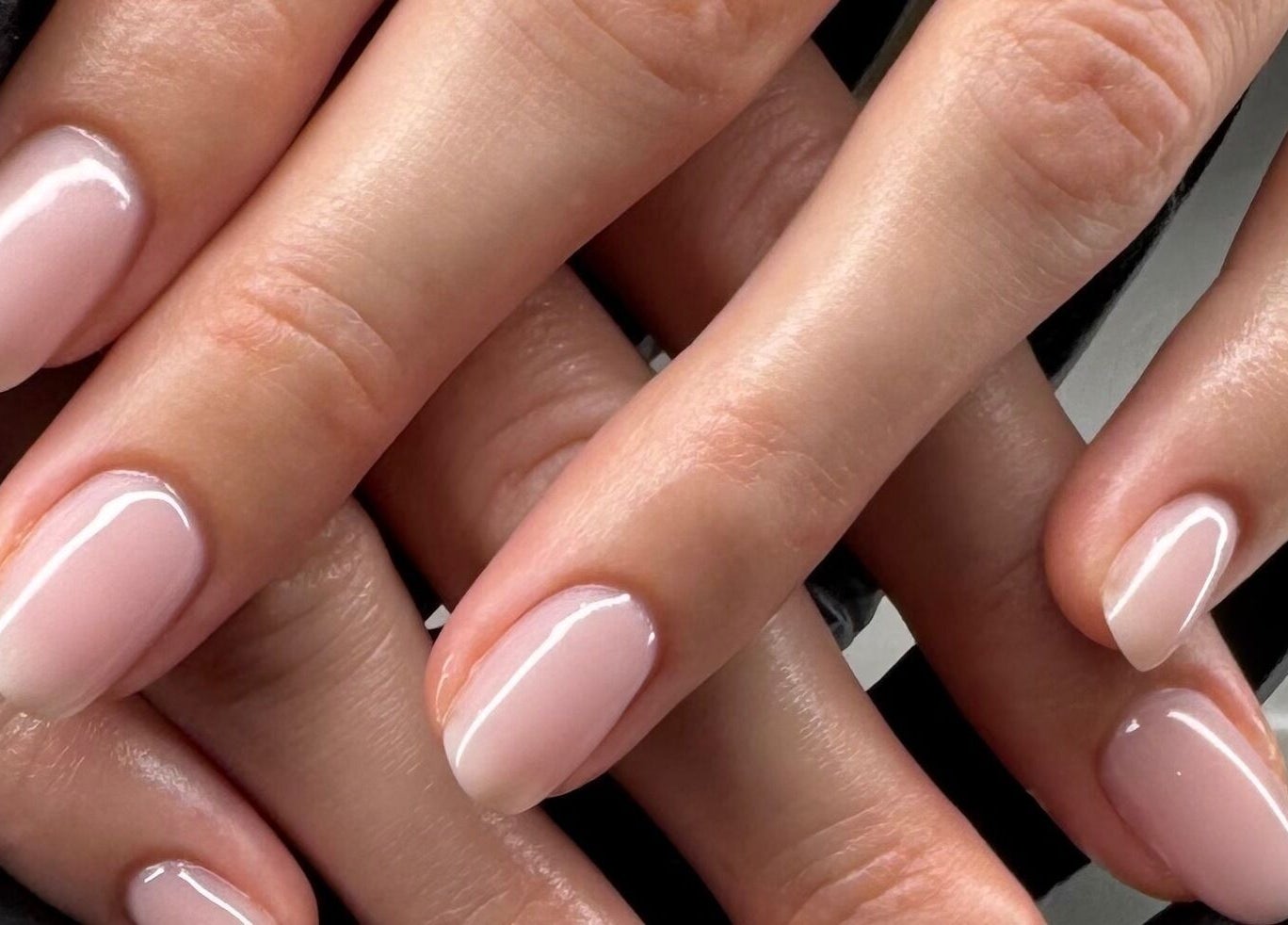 Elegant manicured nails at Gel Lane Co., Southport, Queensland, AU showcasing a soft pink finish.