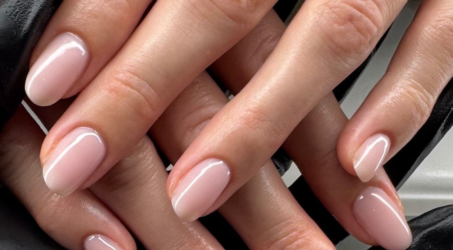 Elegant manicured nails at Gel Lane Co., Southport, Queensland, AU showcasing a soft pink finish.