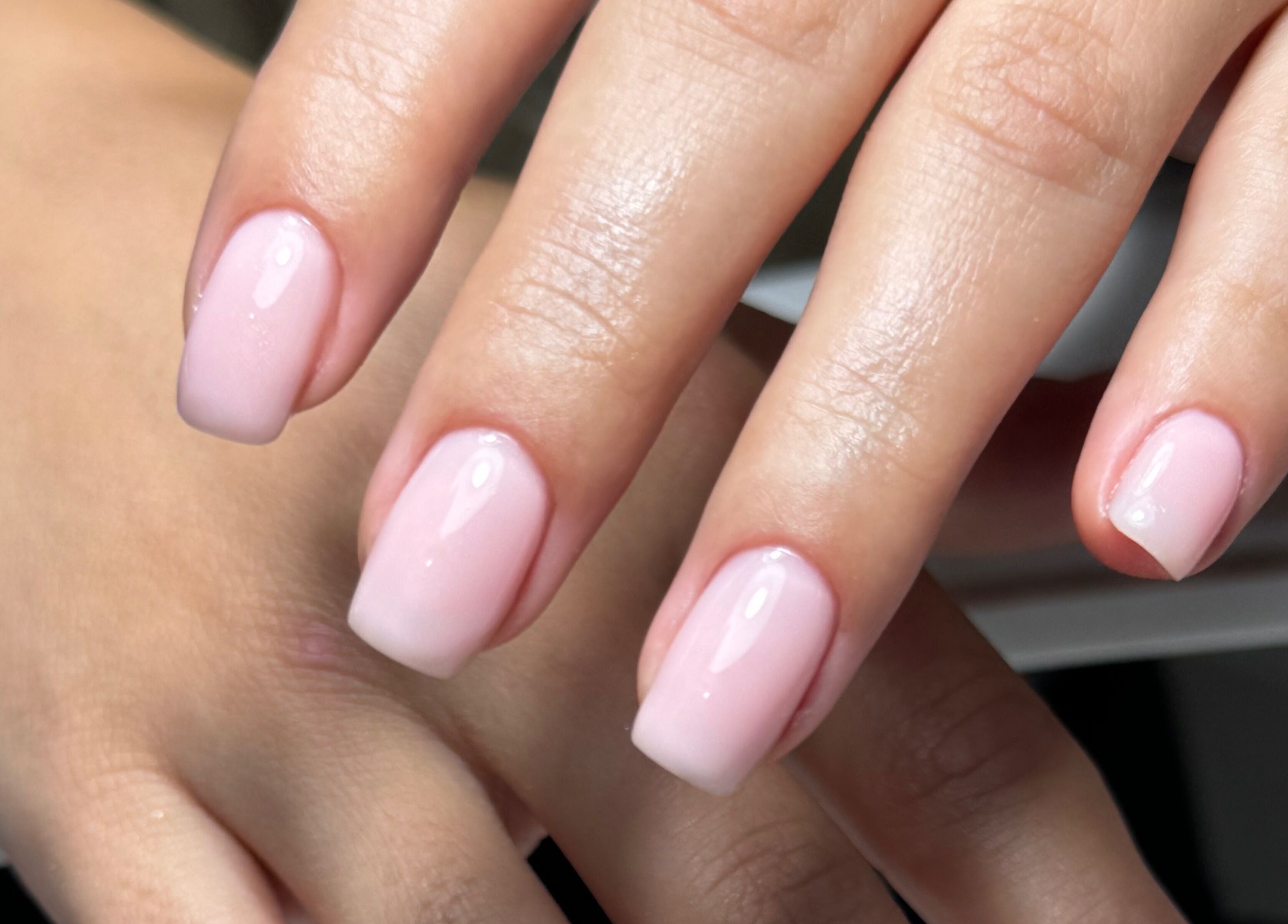 Glossy pastel pink nails designed at Gel Lane Co., Southport, Queensland, AU, showcasing elegance and care.