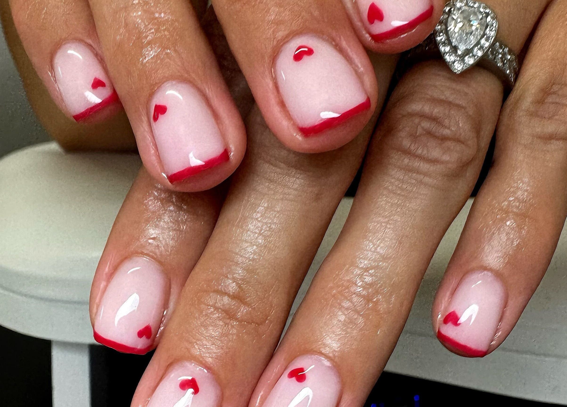 Elegant nail art with red heart accents at Gel Lane Co., Southport, Queensland, AU.