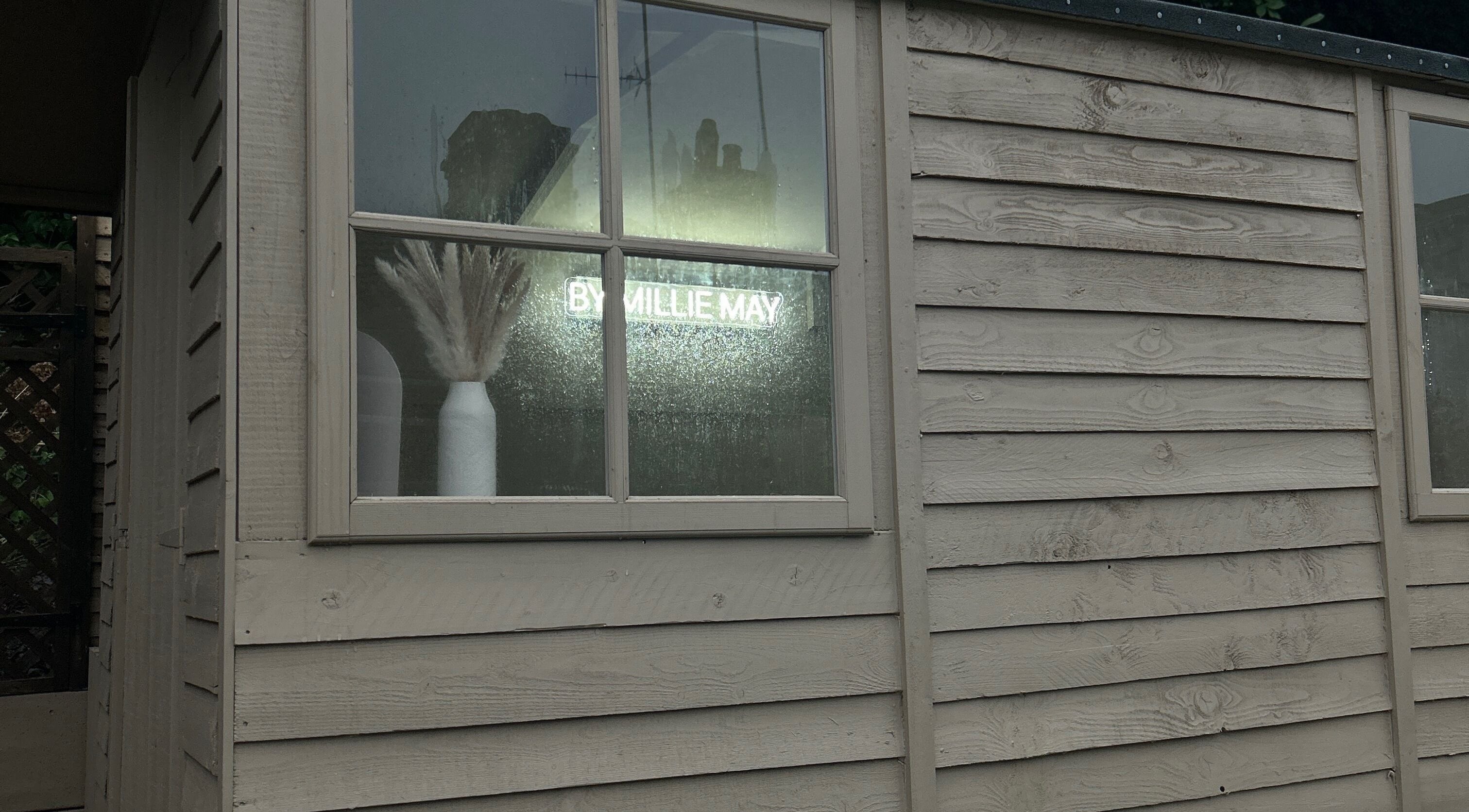 ByMillieMay exterior view with window and pampas grass, Hemel Hempstead, England, GB.