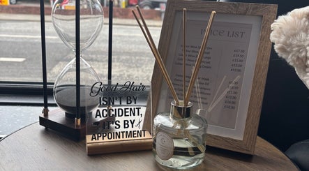 Inviting decor and price list at The Hair Duo, Airdrie, Scotland, GB.