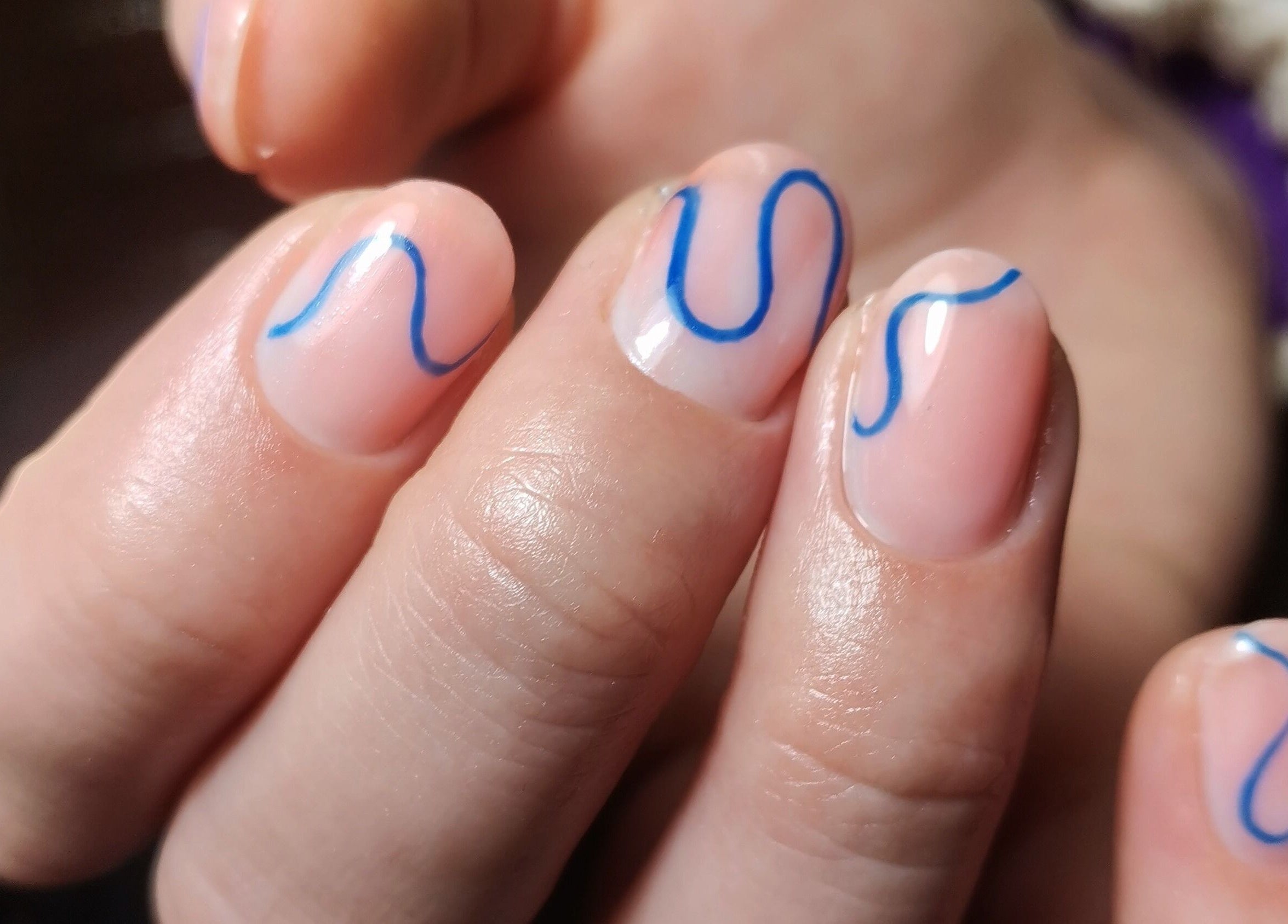Elegant blue wave nail art at Raak Rustig Nails in Jeffreys Bay, Eastern Cape, ZA.
