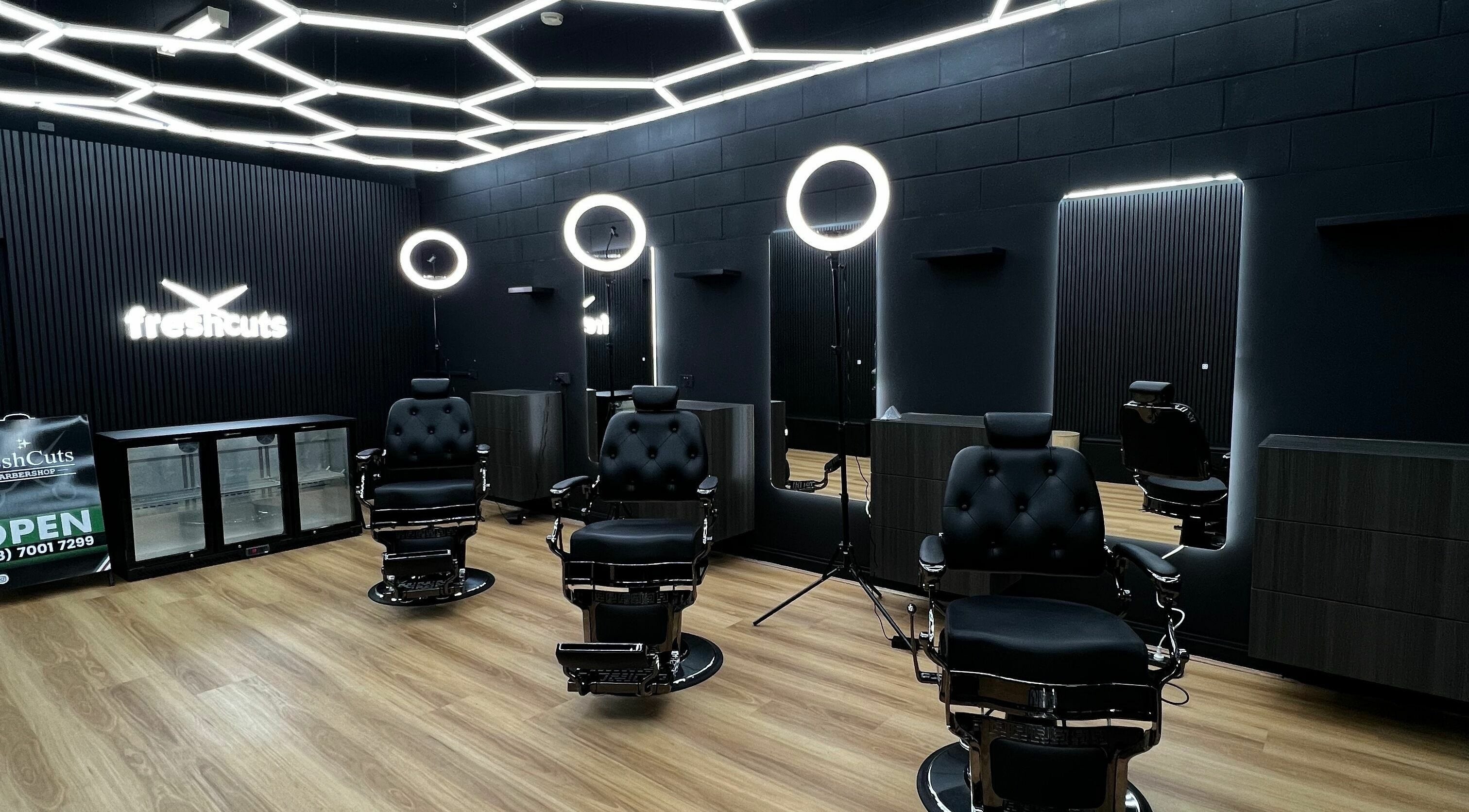 Sleek interior of FreshCuts Blackwood with modern barber chairs in Blackwood, South Australia, AU.