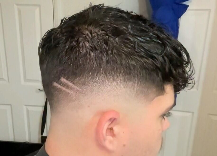 Close-up of trendy fade haircut at L’s House Of Hair, Kibworth Harcourt, England, GB.