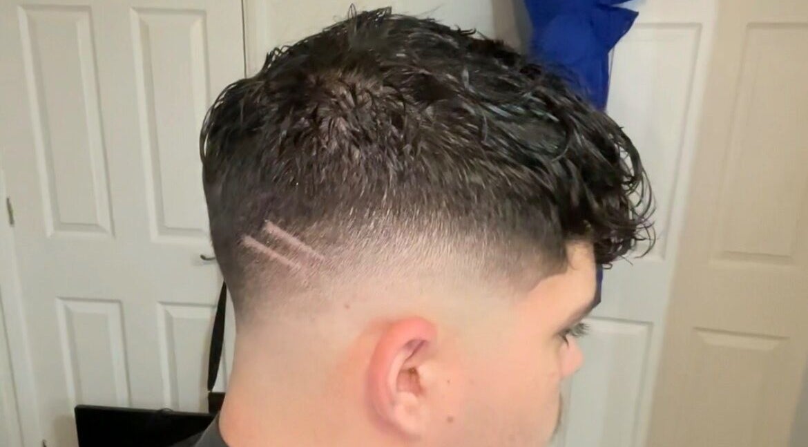 Close-up of trendy fade haircut at L’s House Of Hair, Kibworth Harcourt, England, GB.