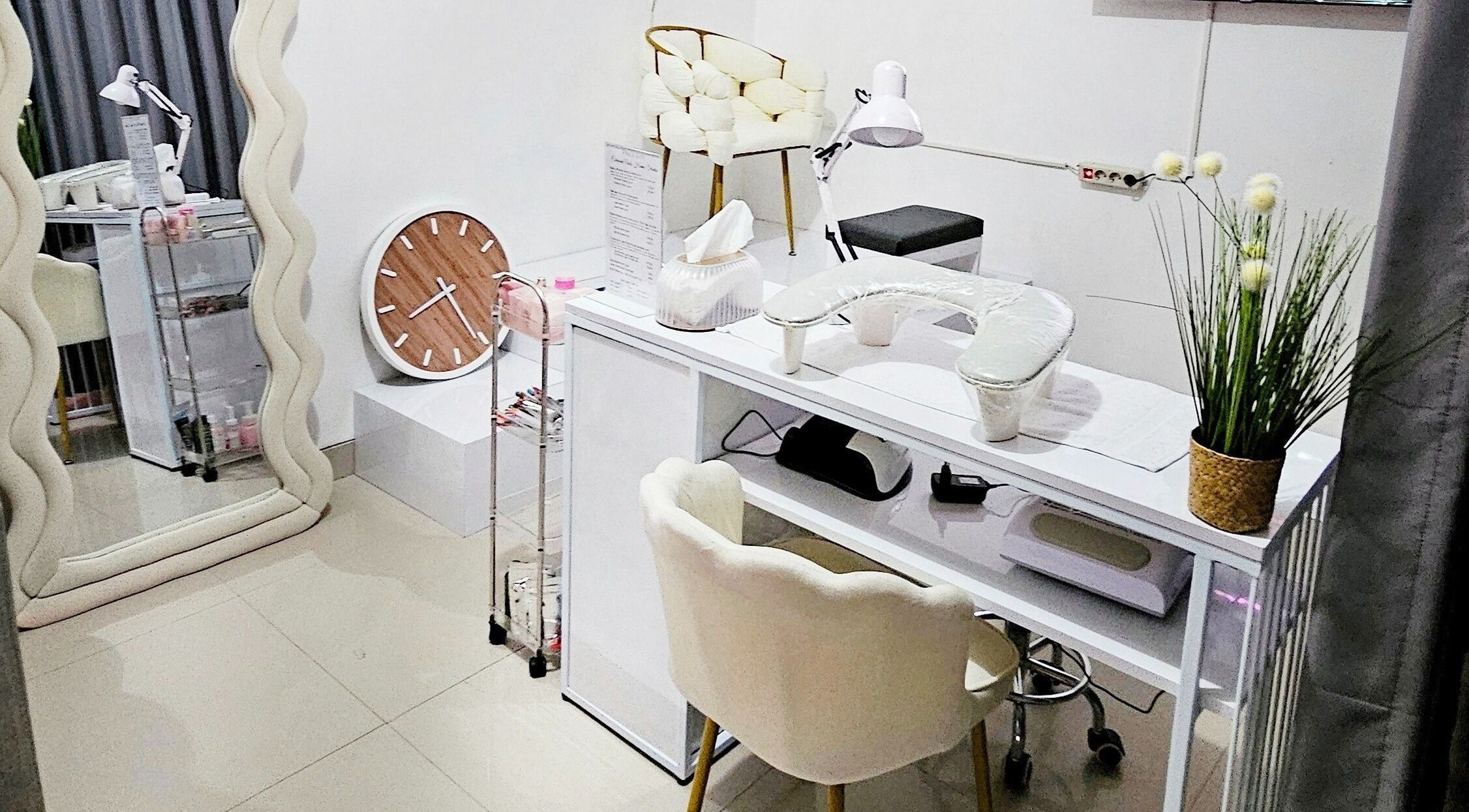 Elegant nail station at Cutie Pai Nails in Bali, Bali, ID, showcasing a modern, cozy setup.