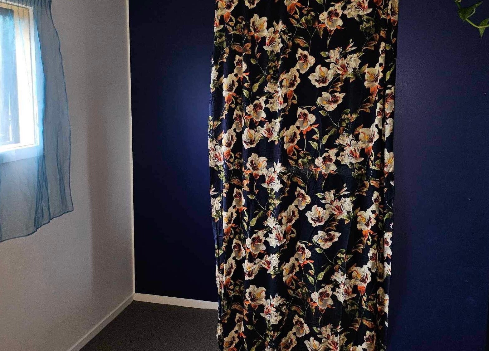 Beautiful floral curtain at Whaitere Ora, Gisborne. A peaceful setting for relaxation and wellness.