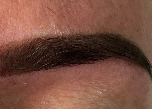 Close-up of styled eyebrow at YG Beauty, Middlesbrough, GB showcasing precise shaping.