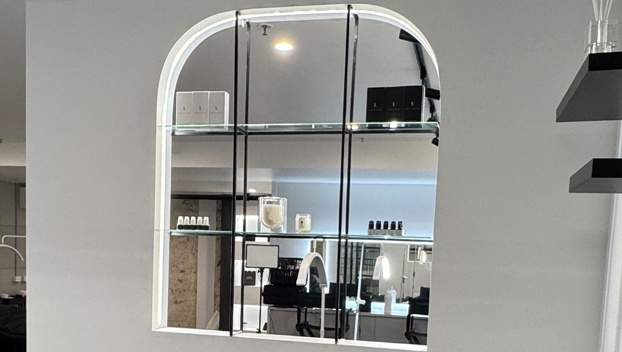 Modern glass shelving in Sophie Humphries Makeup - Rosebery, Rosebery, New South Wales, AU, showcasing beauty products.