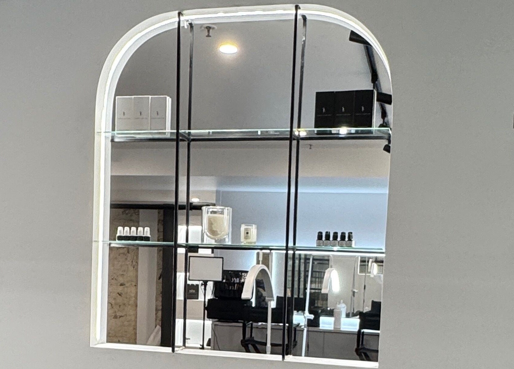 Modern glass shelving in Sophie Humphries Makeup - Rosebery, Rosebery, New South Wales, AU, showcasing beauty products.