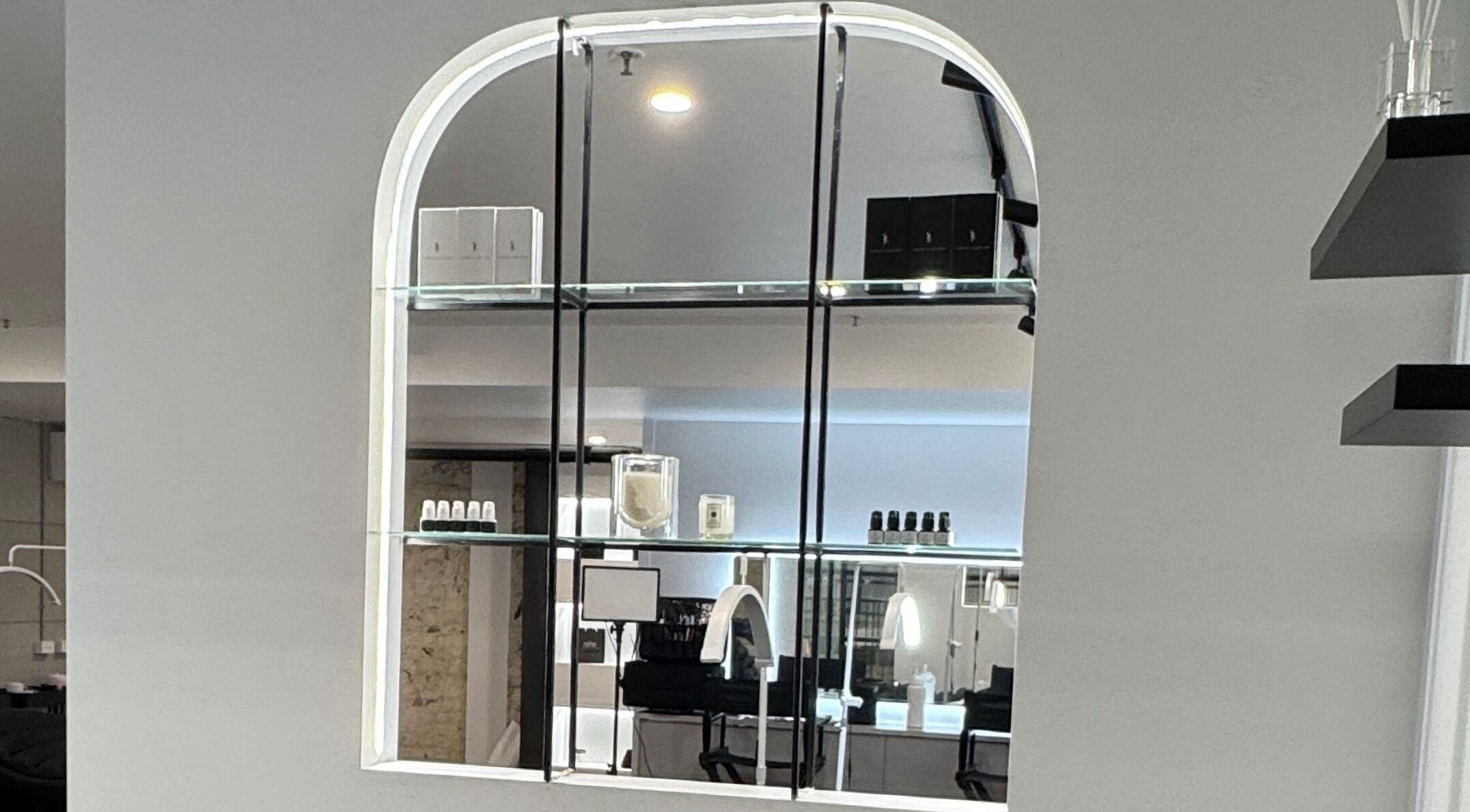 Modern glass shelving in Sophie Humphries Makeup - Rosebery, Rosebery, New South Wales, AU, showcasing beauty products.