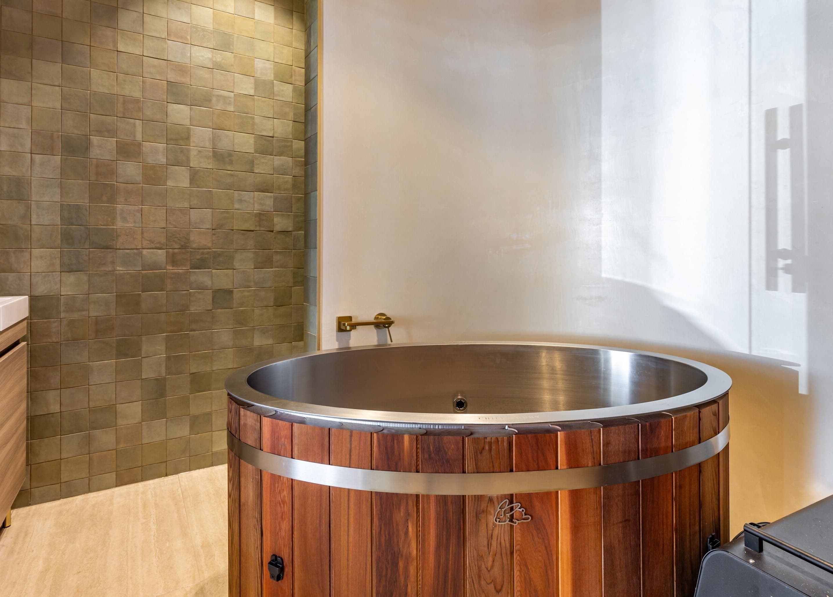 Luxurious wooden spa tub at Elite Body Recovery and Wellbeing, Maroubra, New South Wales, AU.