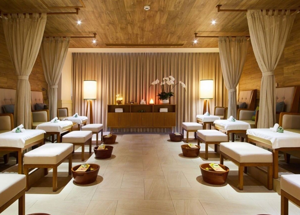 Relaxing massage room at Maia Spa by Fusion, Vũng Tàu, Bà Rịa - Vũng Tàu, VN with elegant decor and soft lighting.