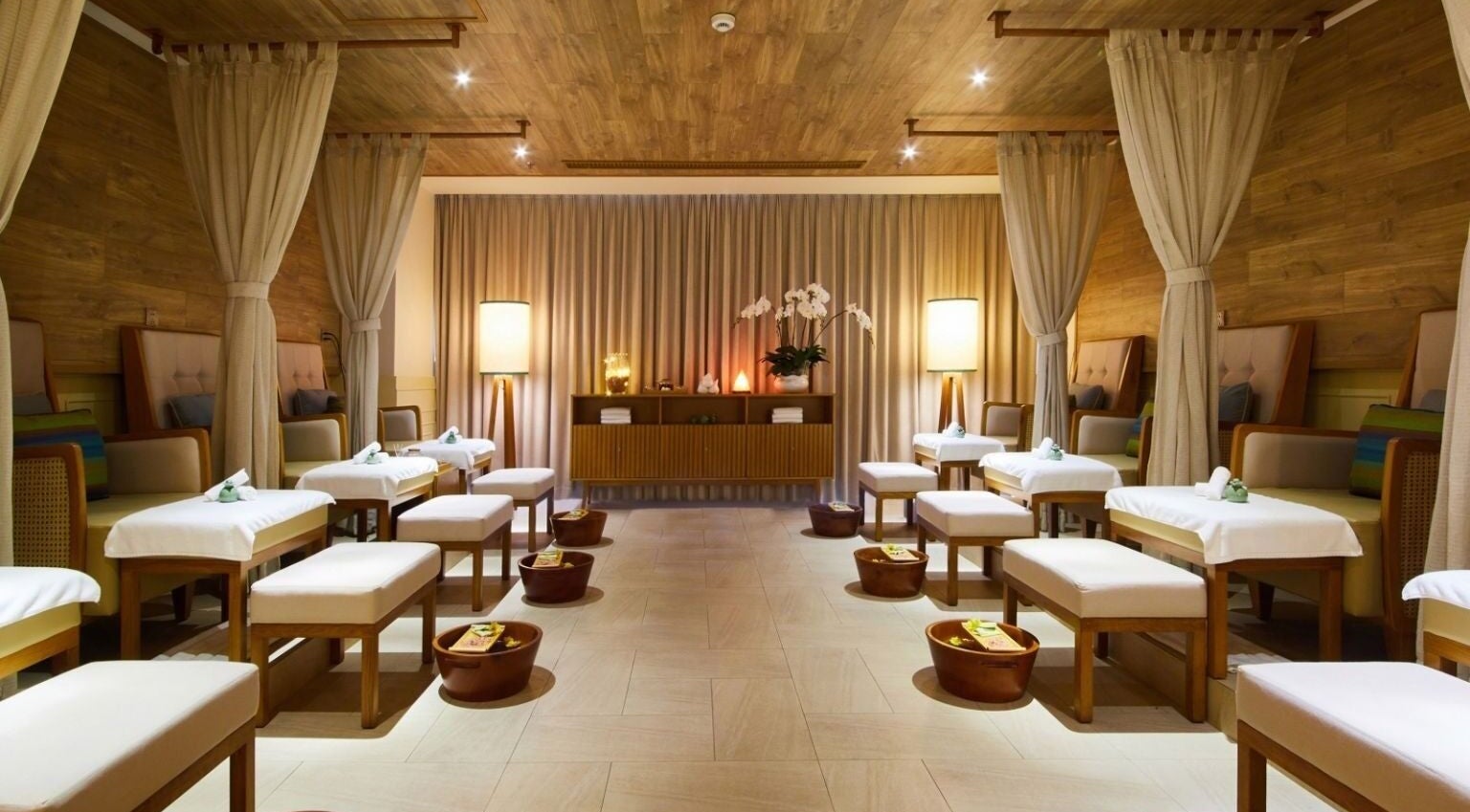 Relaxing massage room at Maia Spa by Fusion, Vũng Tàu, Bà Rịa - Vũng Tàu, VN with elegant decor and soft lighting.