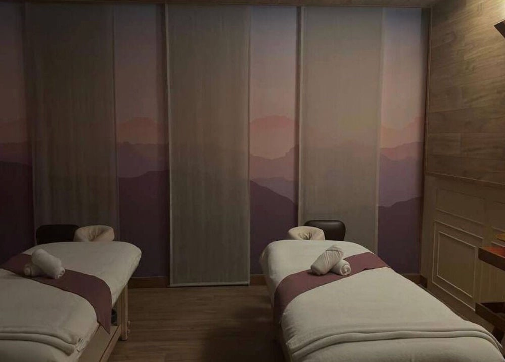 Relaxing massage room at Maia Spa by Fusion, Vũng Tàu, Bà Rịa - Vũng Tàu, VN, with twin beds and tranquil lighting.