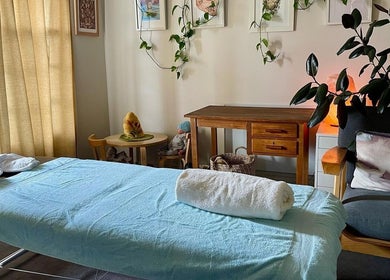 Cozy massage room at Holistic Massage and Facial for Women, Healesville, Victoria, AU with a tranquil ambiance.