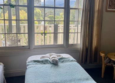 Tranquil massage room at Holistic Massage and Facial for Women, Healesville, Victoria, AU with nature view.