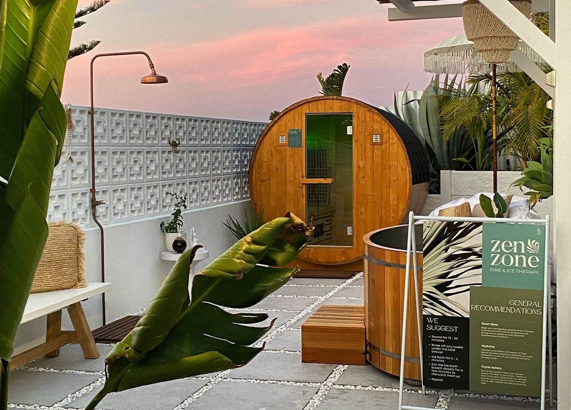 Outdoor sauna experience at Zen Zone Perth, Beldon, Western Australia, AU under a serene sunset sky.