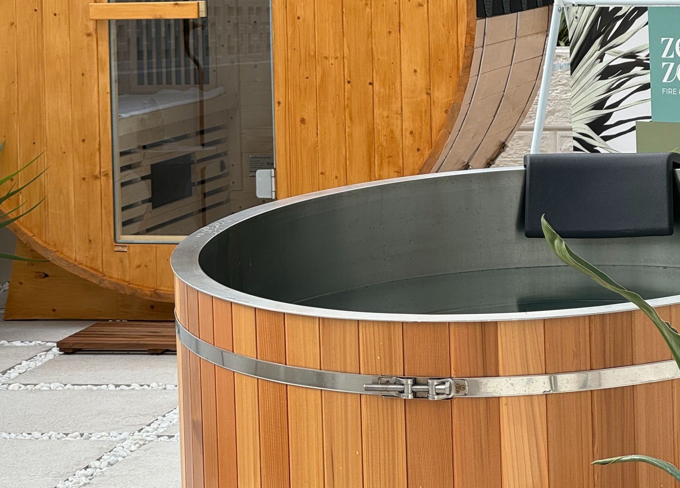 Relaxing wooden hot tub at Zen Zone Perth, Beldon, Western Australia, AU with a modern sauna backdrop.