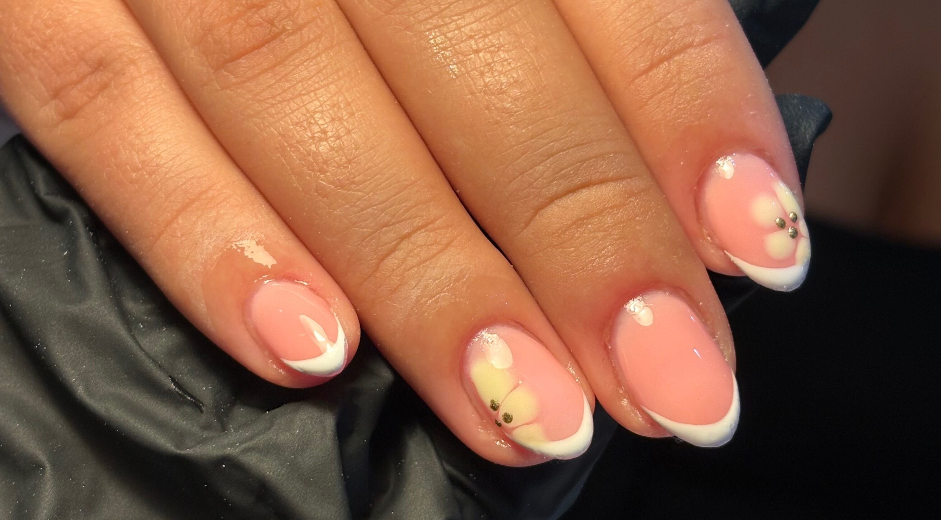 Delicate floral nail art with pink and white at BIABI Nails & Beauty, Glasgow, Scotland, GB.