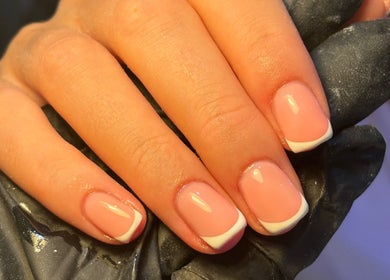 Elegant French manicure at BIABI Nails & Beauty in Glasgow, Scotland, GB showcasing glossy nails.