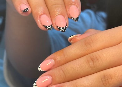 Elegant dotted nail art at BIABI Nails & Beauty, Glasgow, Scotland, GB showcasing pink and black design.