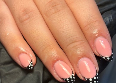 Close-up of pink and polka dot nail art at BIABI Nails & Beauty, Glasgow, Scotland, GB.