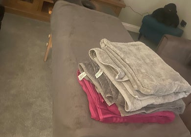 Massage table with fresh towels at Relax and Renew - Mobile Massage Service, Bolton, England, GB.