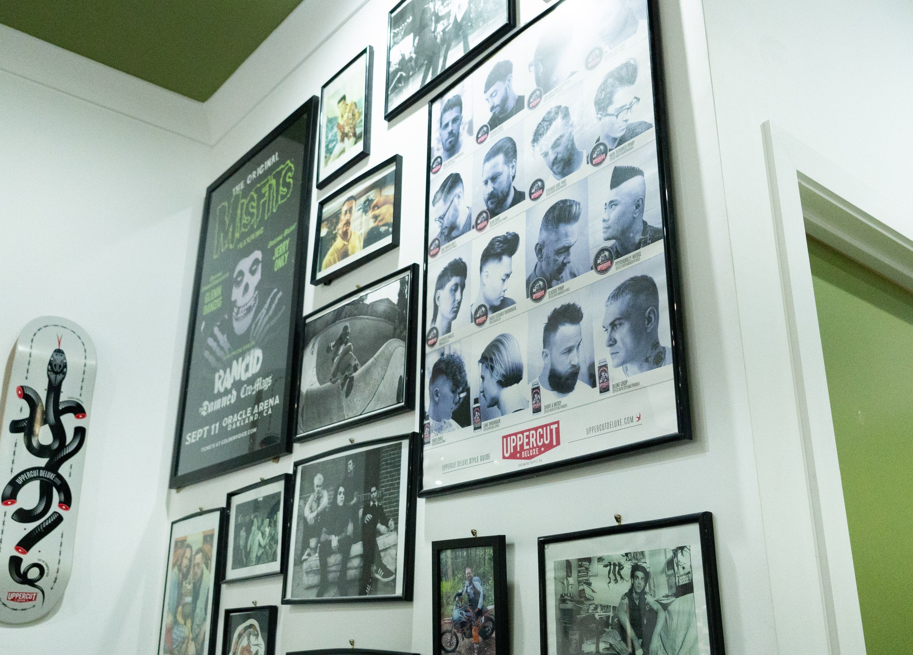 Artistic decor at Nine Lives Barbershop, Paradise Point, Queensland, AU showcases vintage and modern barbering styles.