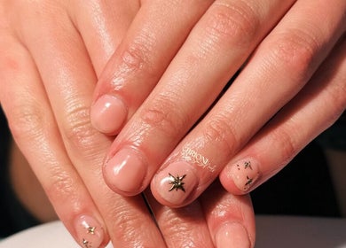 Elegant star-themed nail design at Brioni Nails, Prince Albert, Saskatchewan, CA.