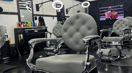 Modern salon chairs at Flow Factory barbershop in Colorado Springs, Colorado, US with sleek design.