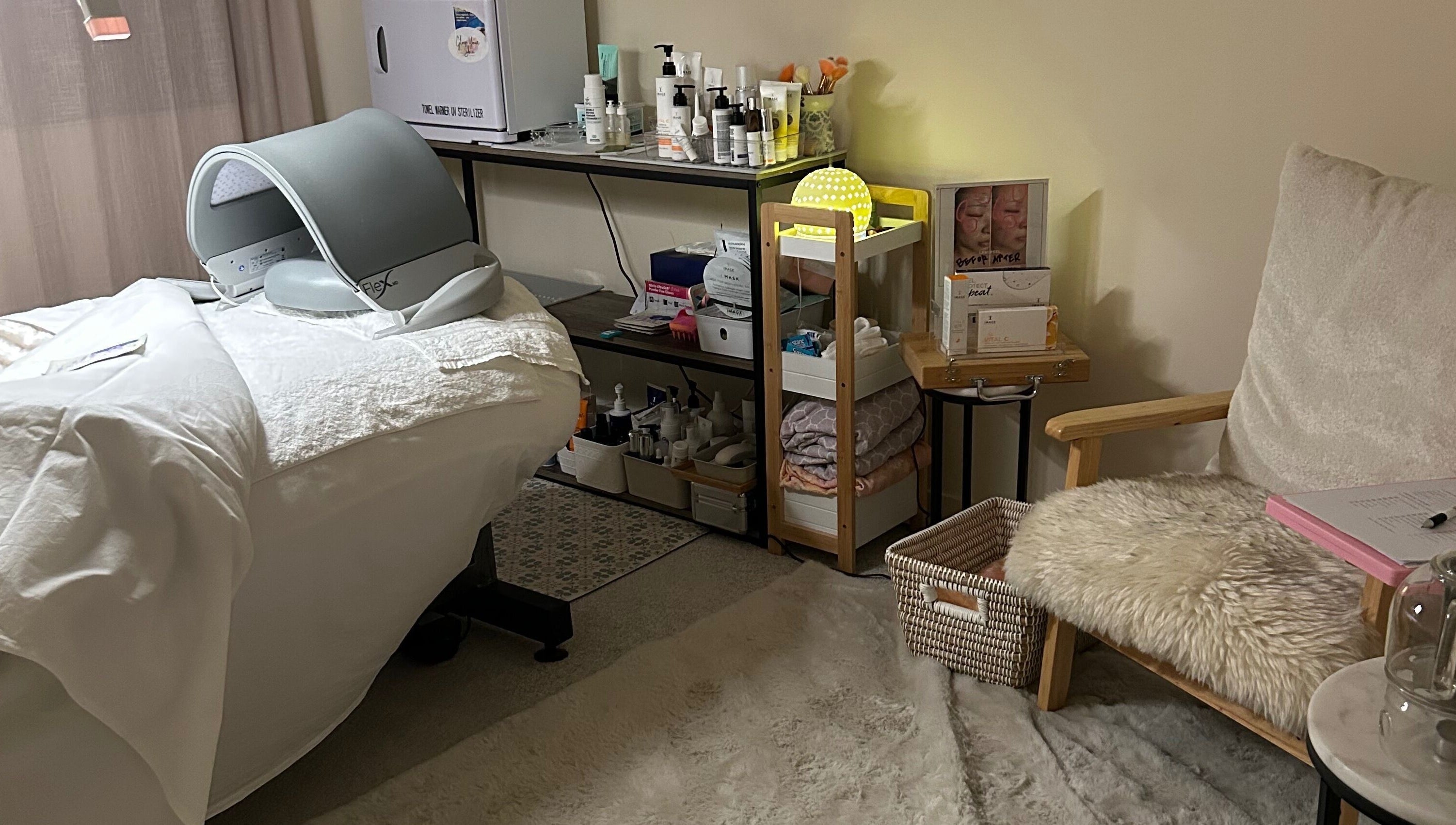 Relaxing spa room at Glow Your Skin by Shona, Chapel Hill, Queensland, AU with treatment bed and skincare products.